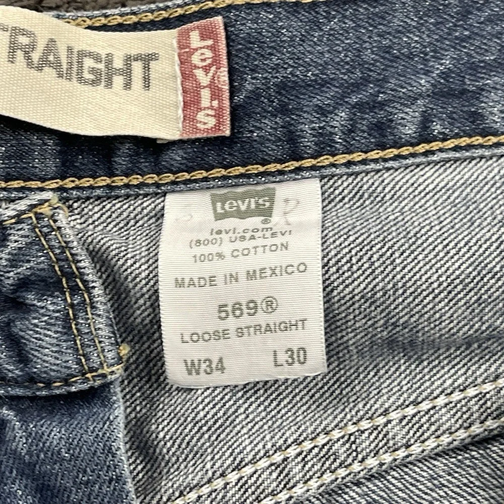 Vintage Levi's 569 Loose Straight Jeans Men's 34x29 Blue Denim Distressed Hem